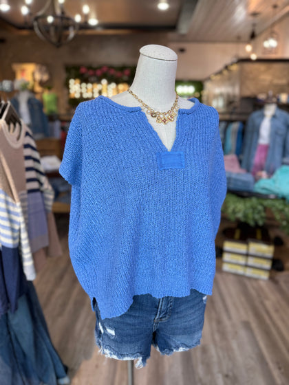 Blue sleeveless sweater
